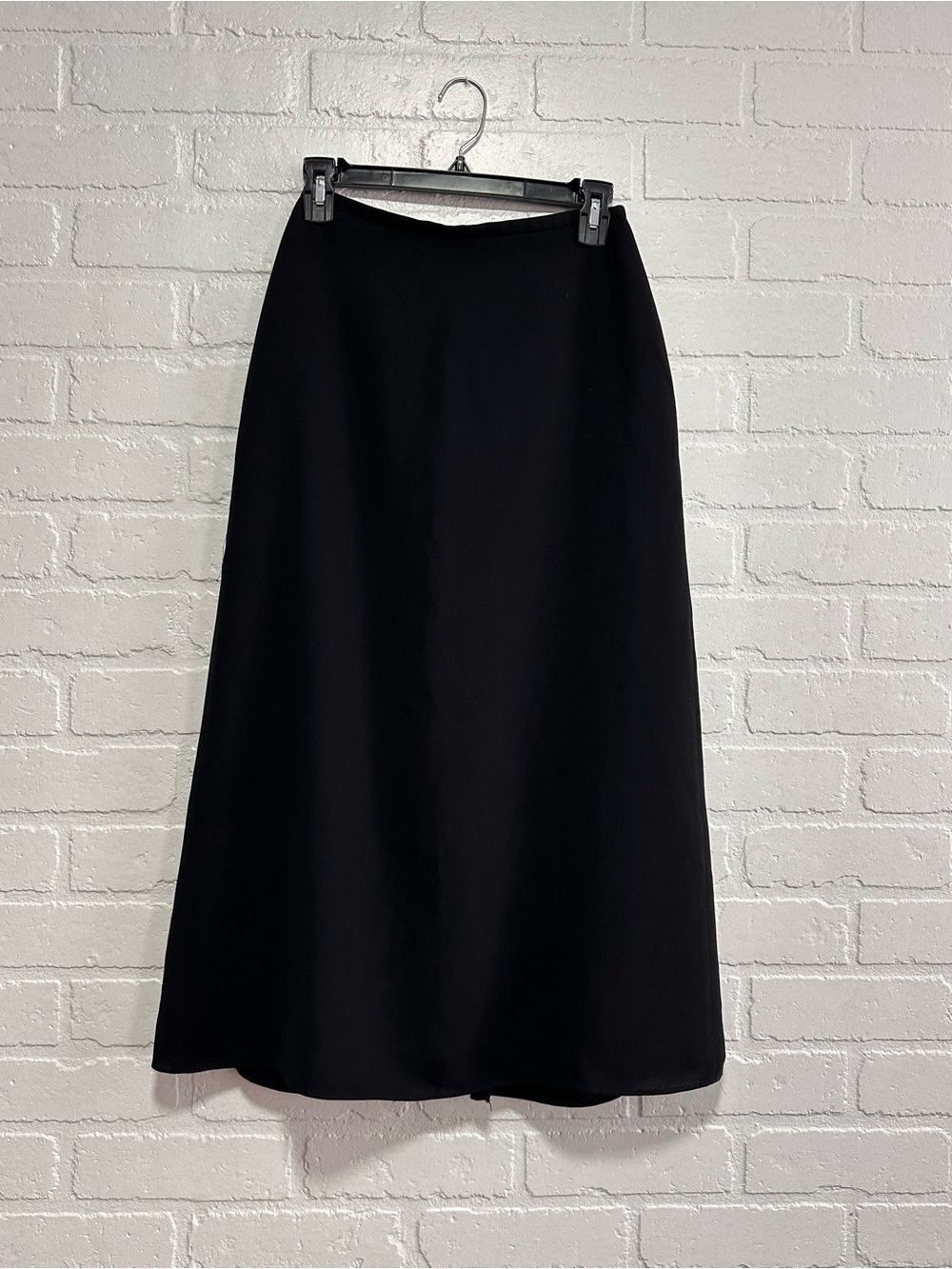 Petite Sophisticate black midi skirt